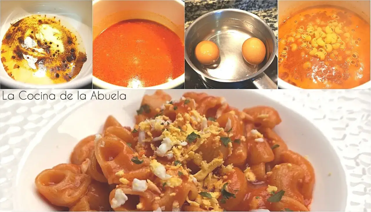 Macarrones con tomate, un plato casero con huevo duro picado. La cocina de la abuela.